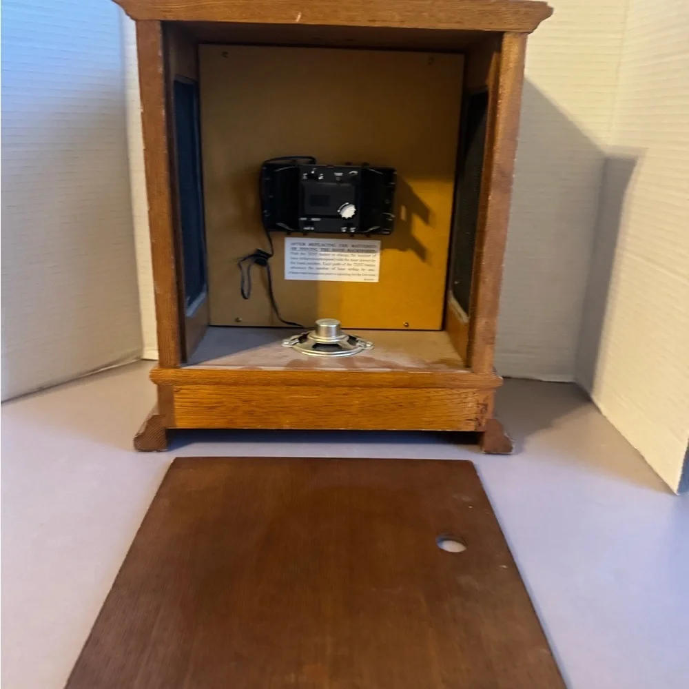 Elegant Wooden Mantel Clock with Gold Detailing